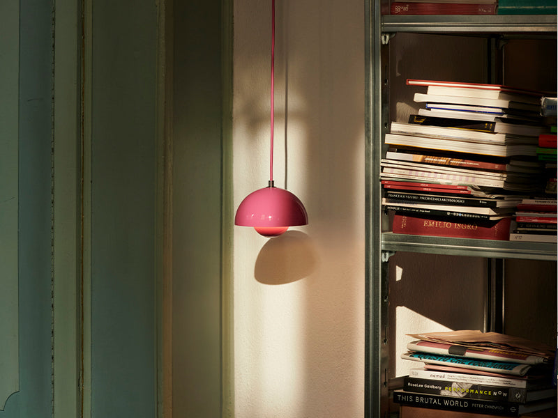 A single tangy pink VP10 Pendant. Designed by Verner Panton for &tradition.