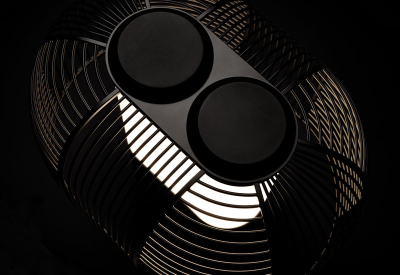 The Yasuke Table Lamp by Studio BrichetZiegler for DCW éditions, viewed from above, with a black background.