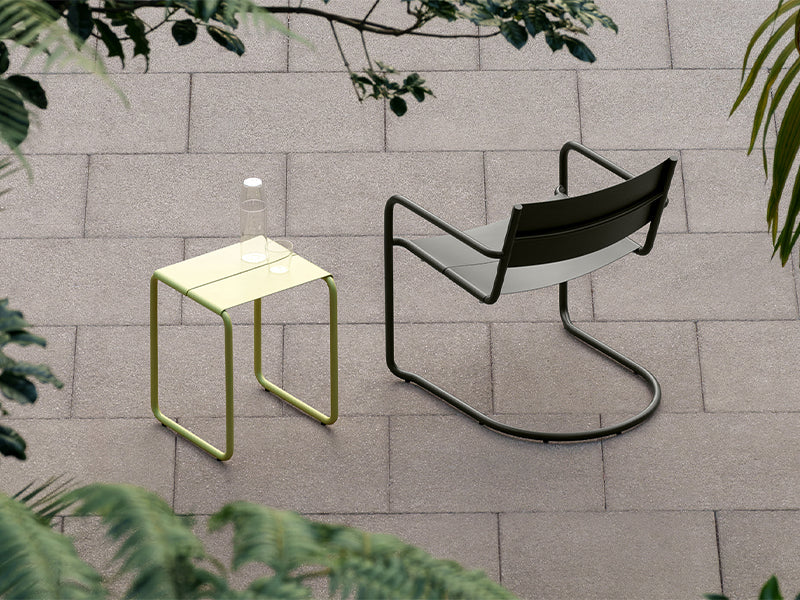 The dining lounge chair and ottoman from the sine range.
