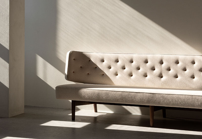 The Radiohus Sofa P3 by Vilhem Lauritzen for Audo Copenhagen in a light filled room.