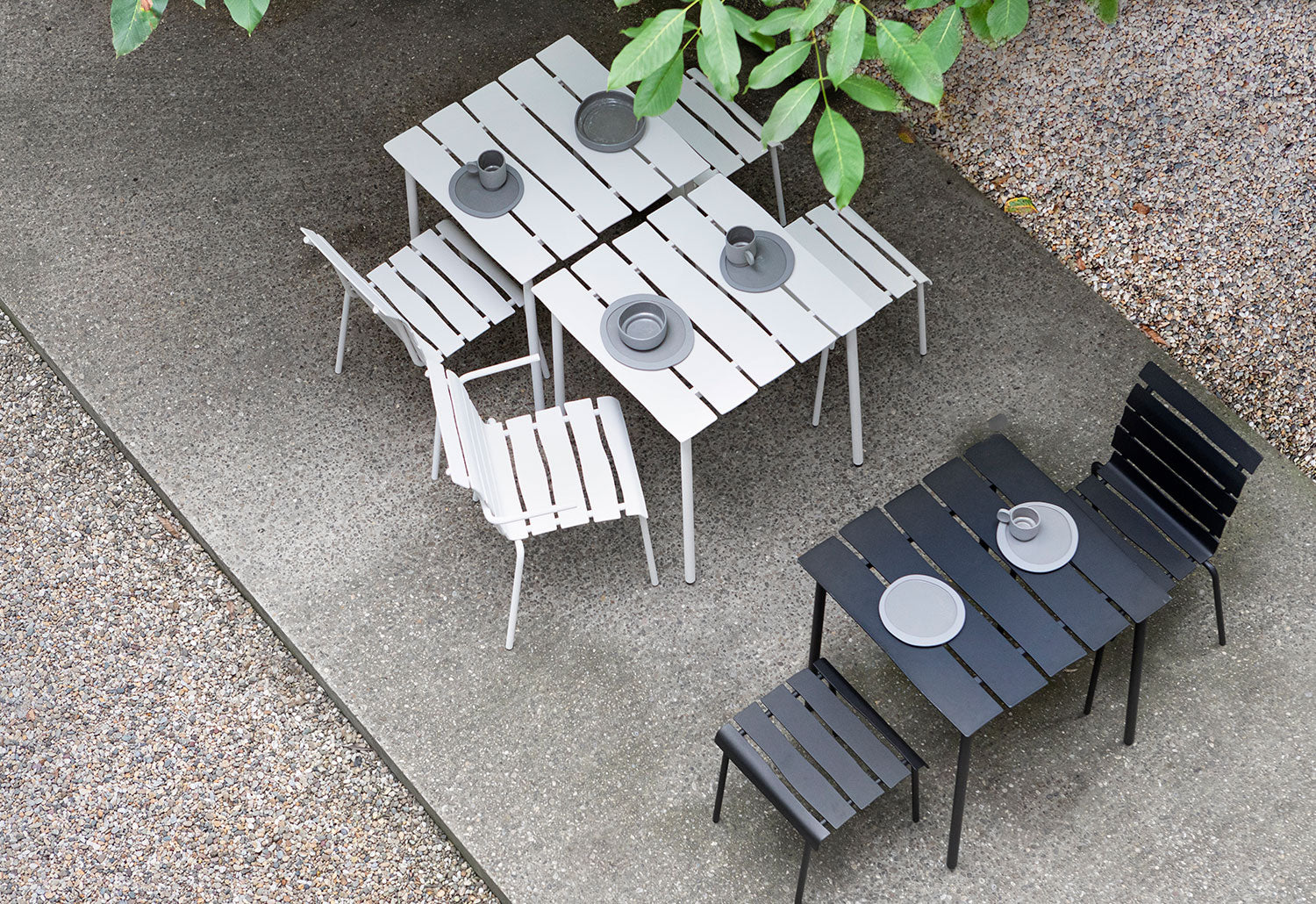 Three Square Aligned Tables by Maarten Baas for Valerie Objects with chairs, in off white and black, top view in garden.