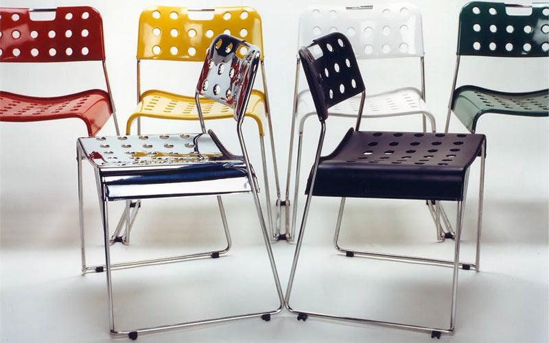 A set of Omkstak Classic chairs in various colours. Designed by Rodney Kinsman for OMK 1965.