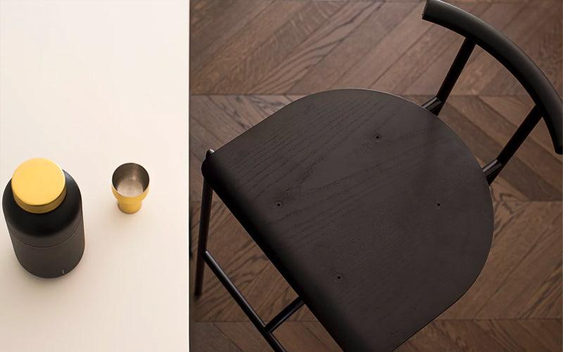 The Tokyo barsool by Rodneky Kinsman for OMK 1965 placed at a counter.