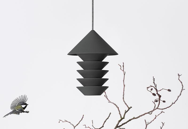 The Silo Bird feeder in slate. Designed by Mika & Julie Tolvanen for Pidät .