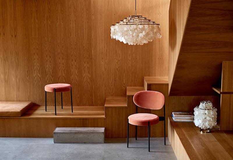 The Series 430 chair amd stool by Verner Panton for Verpan, upholstered in a pink fabric.