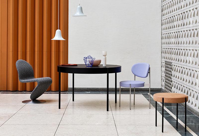 The Series 430 table by Verner Panton for Verpan pictured with other products of the range, and the 1-2-3 system seat.