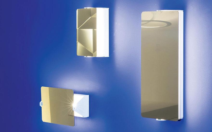 The Volet Pivotant family by Charlotte Perriand for Nemo Lighting in stainless steel.