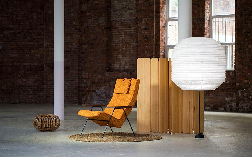 -twentytwentyone anniversary edition reclining chair by Robin day with Hotaru floor light, Separat divider and Franco Albini ottoman