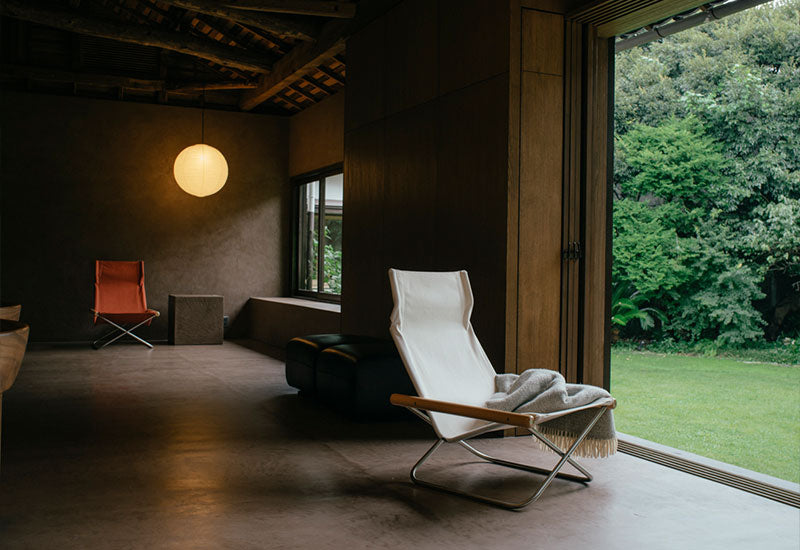 The Nychair X chair in terracotta and white.