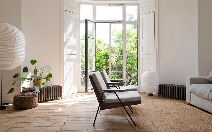 Chevron armchair by Robin Day with Hotaru double bubble floor lamp from twentytwentyone