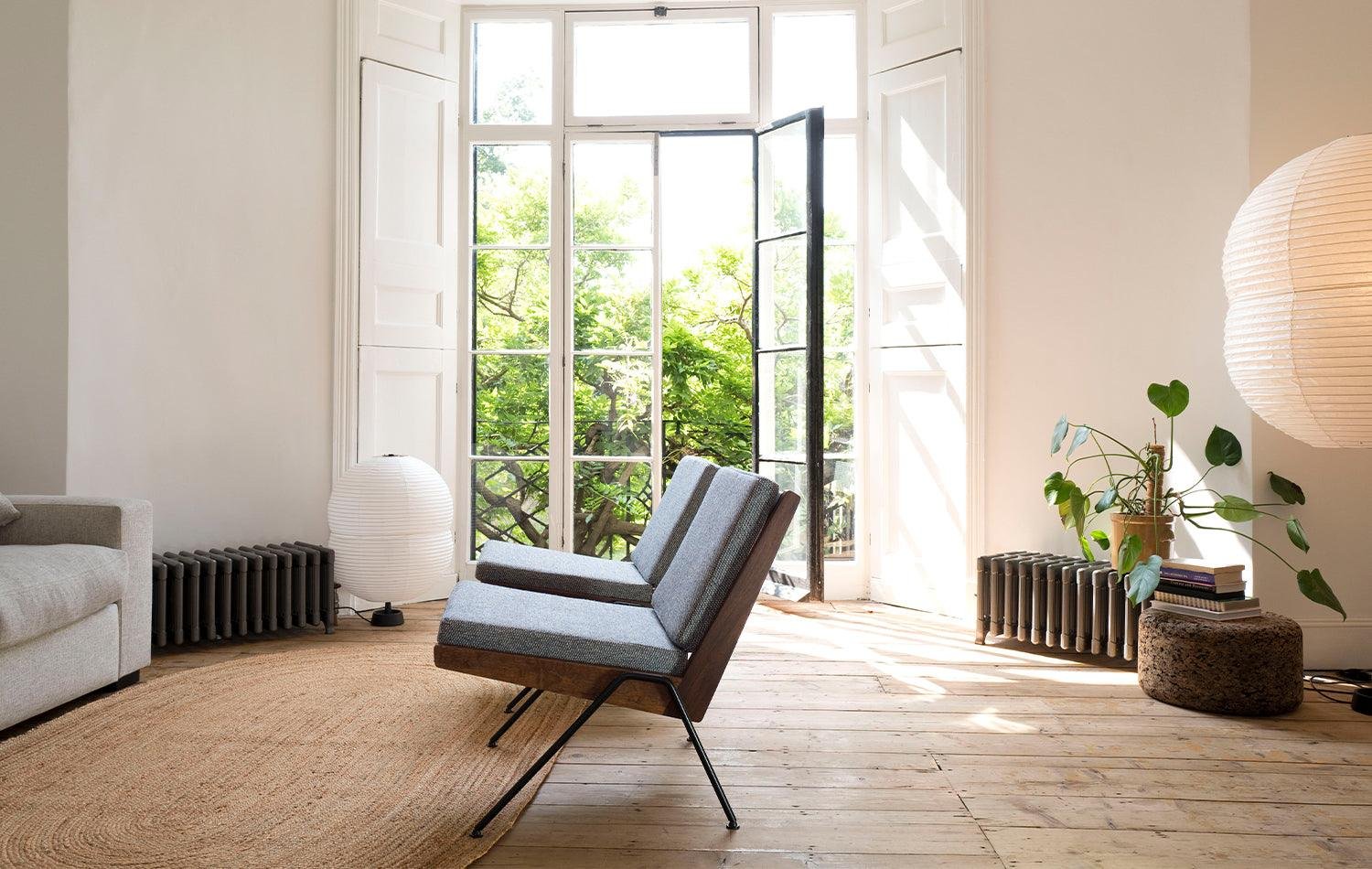 Chevron chair by Robin Day with Hotaru double bubble floor lamp from twentytwentyone