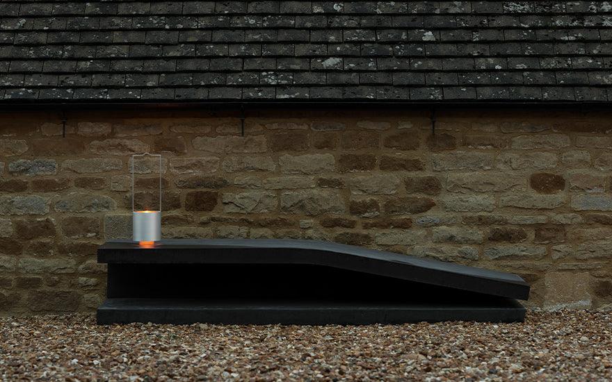 Wastberg Holocene 4 on a black stone bench