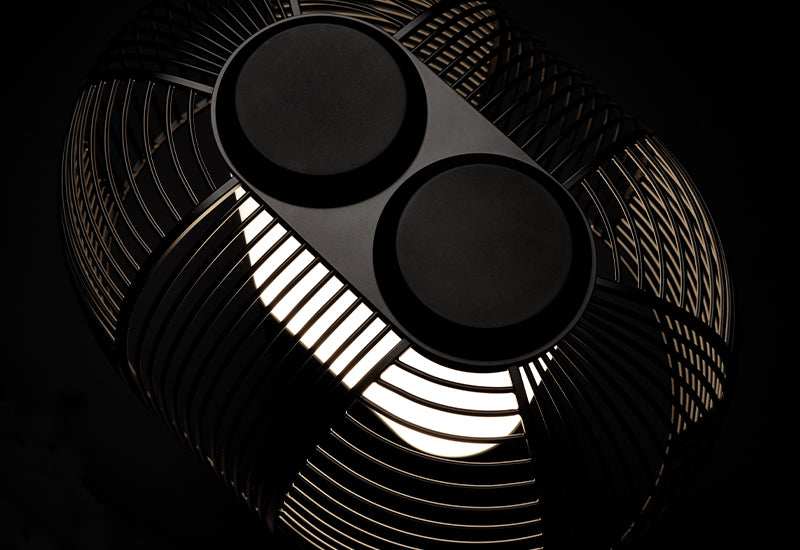  The Yasuke Table Lamp by Studio BrichetZiegler for DCW éditions, viewed from above, with a black background.