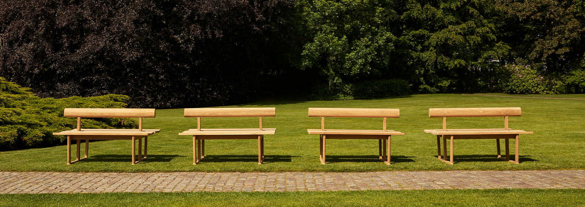  Fritz Hansen Banco bench by Hugo Passos used for public seating in a park